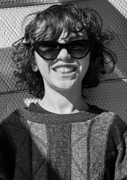 young boy wearing Pala sustainable sunglasses