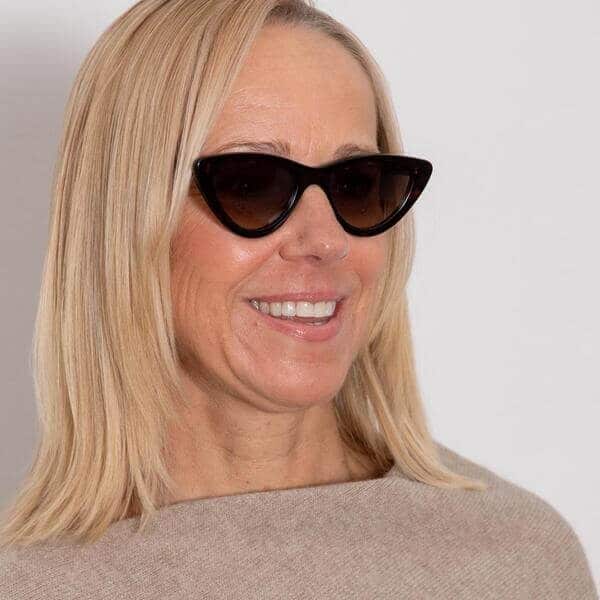 woman wearing brown eco-friendly sunglasses with eco lenses