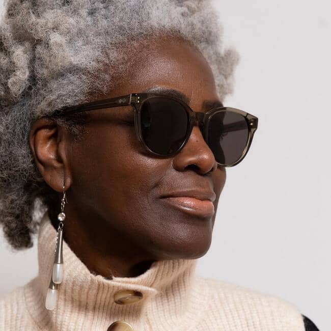 woman wearing oversize round sustainable sunglasses