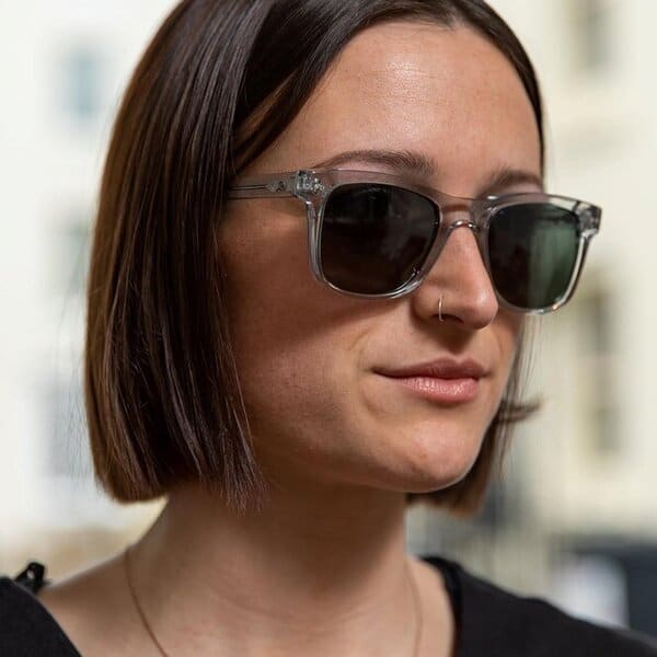 woman wearing transparent eco-friendly sunglasses