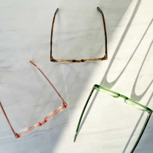 Bio-acetate blocking glasses in green, brown and pink.
